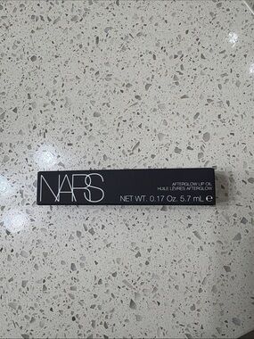 NARS Wondrous 520 Afterglow Lip Oil - Black Packaging